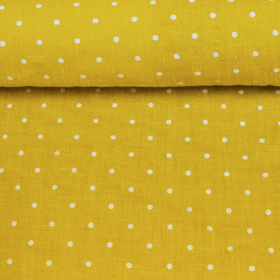 Washed linen fabric in lemon colour with white dots, 205 g/m²