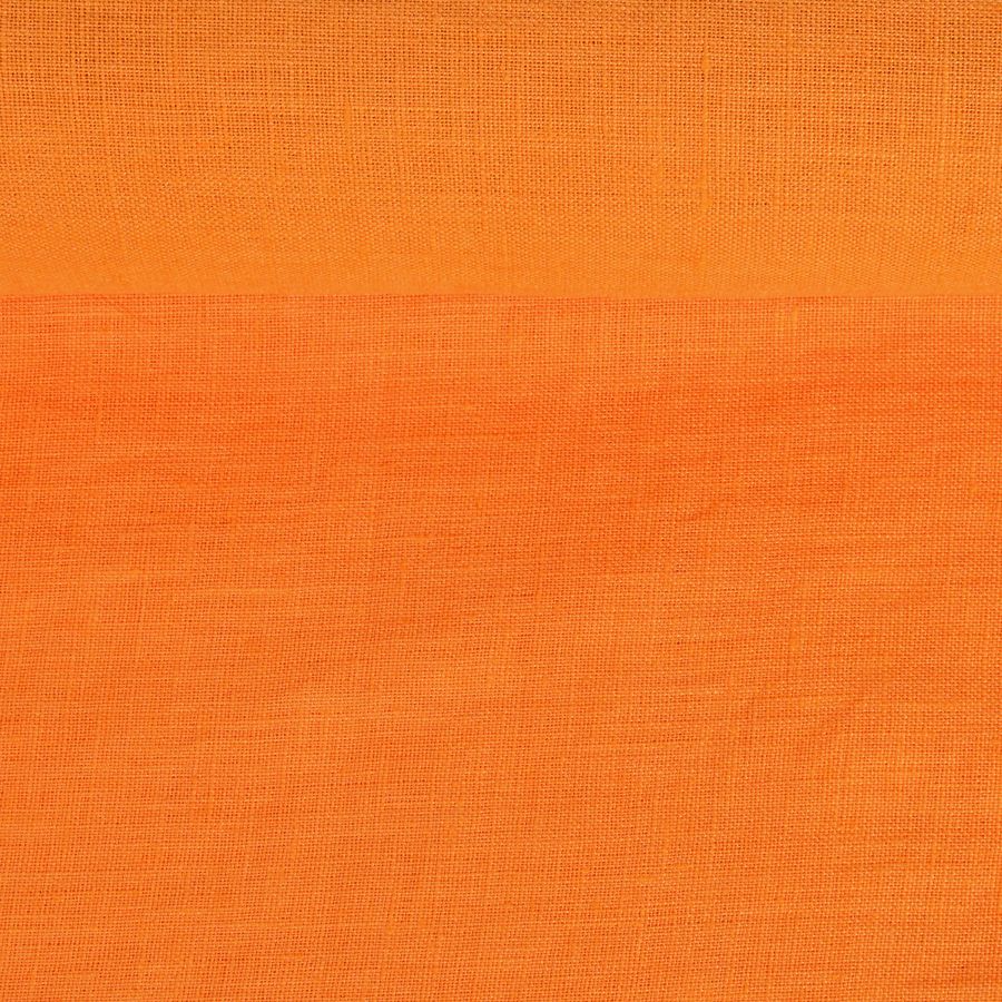 Washed linen fabric in orange colour, 205 g/m²