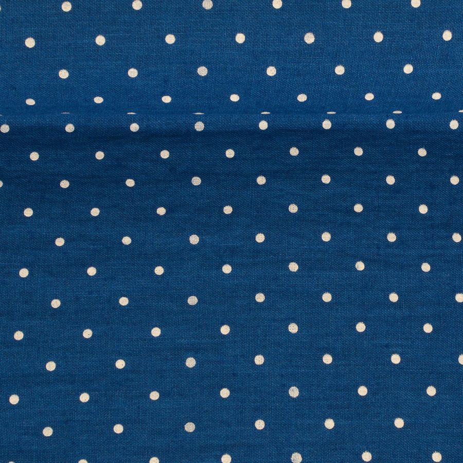 Washed dark blue linen fabric in white dots pattern, 205 g/m²