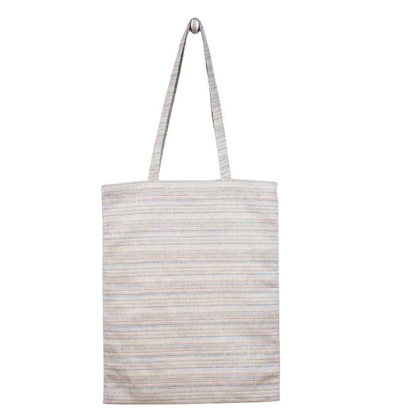 Multicolored shopping bag in light bluish color