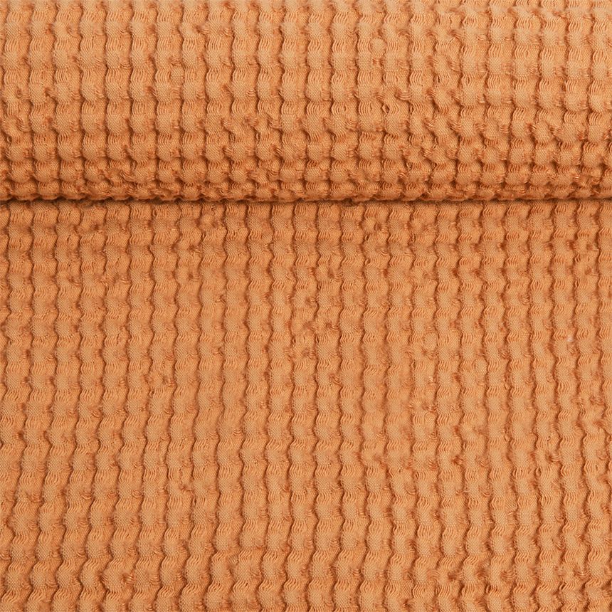 Washed waffle weave fabric in peach colors, 310 g/m² (Bale)