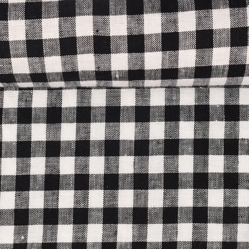 Washed linen fabric in black and small white checks, 195 g/m²